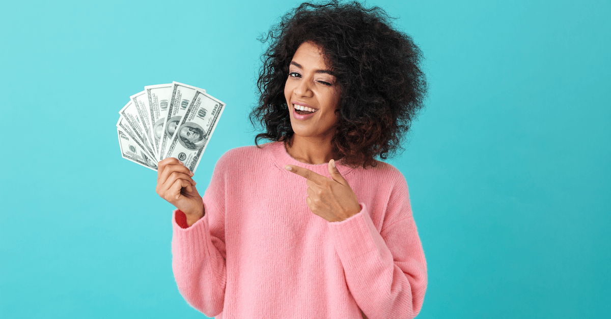 Woman holding money