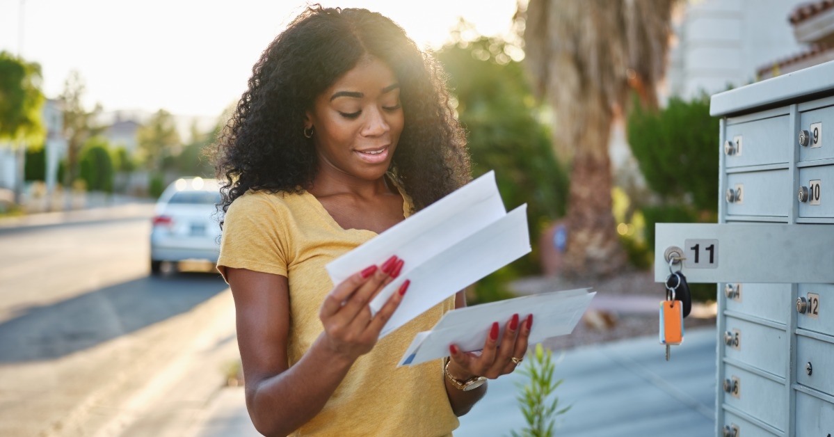 woman checking mail