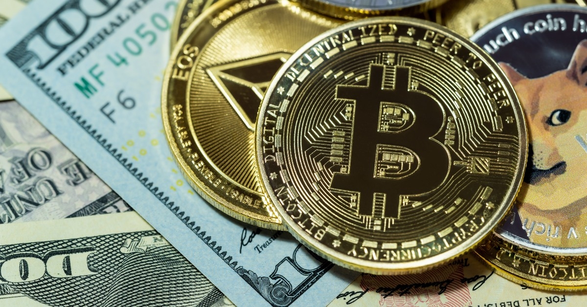cryptocurrency coins and cash