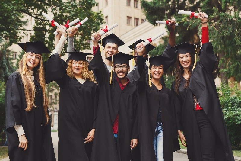 A group of graduates celebrating