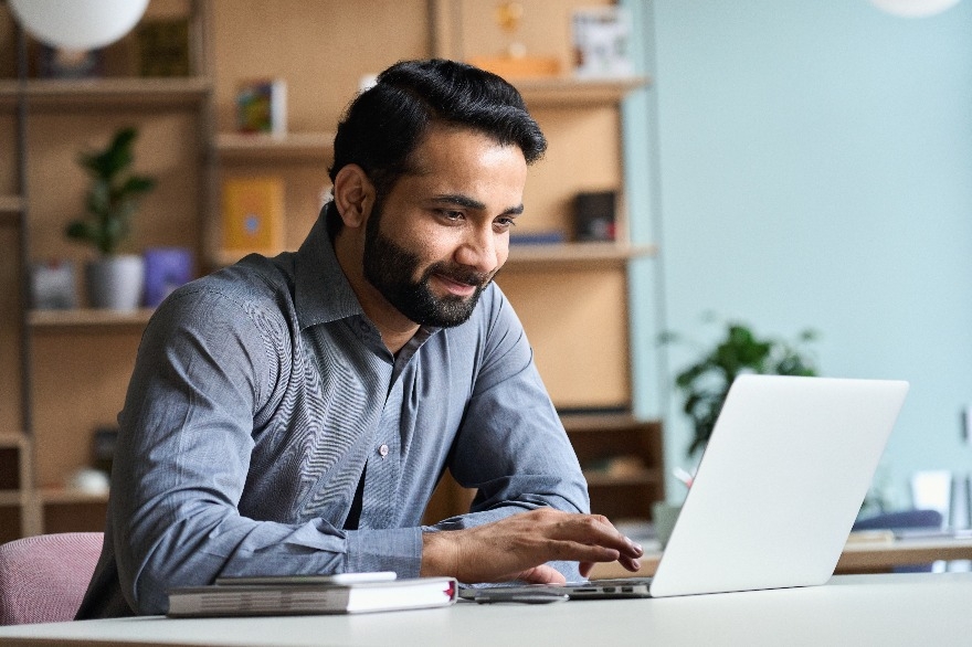 student using computer studying