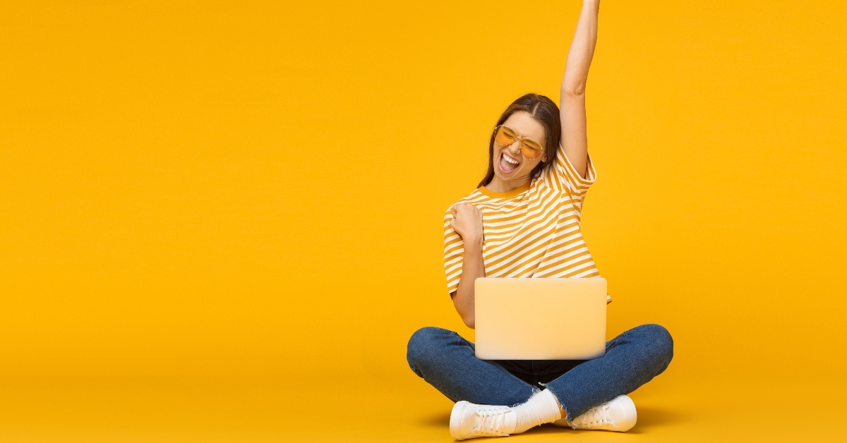 Happy woman with computer