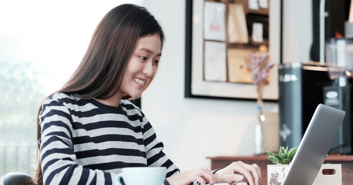 Woman paying bills online