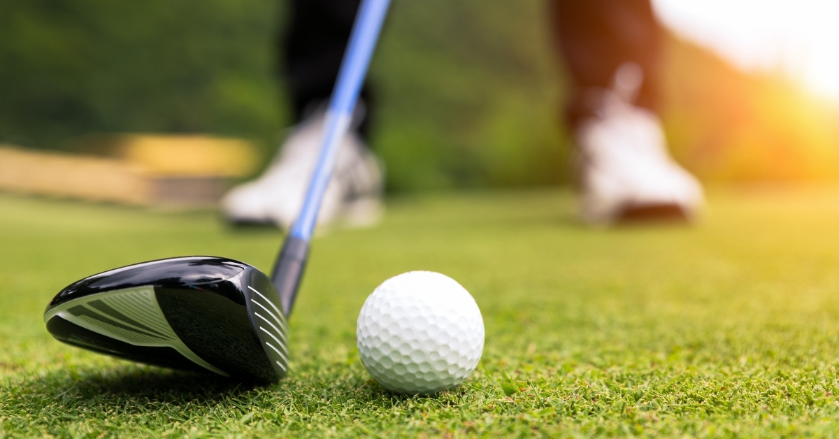 Golf ball and club