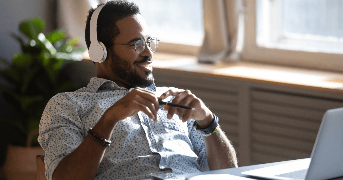 man listening to podcast