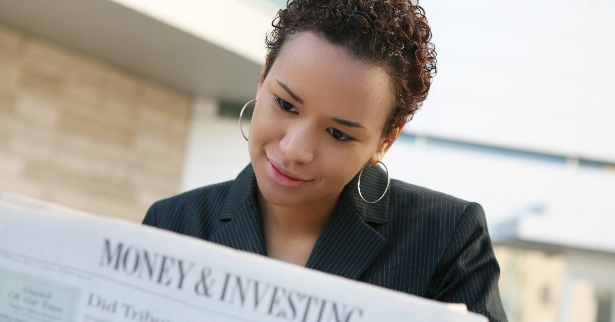Woman with newspaper 