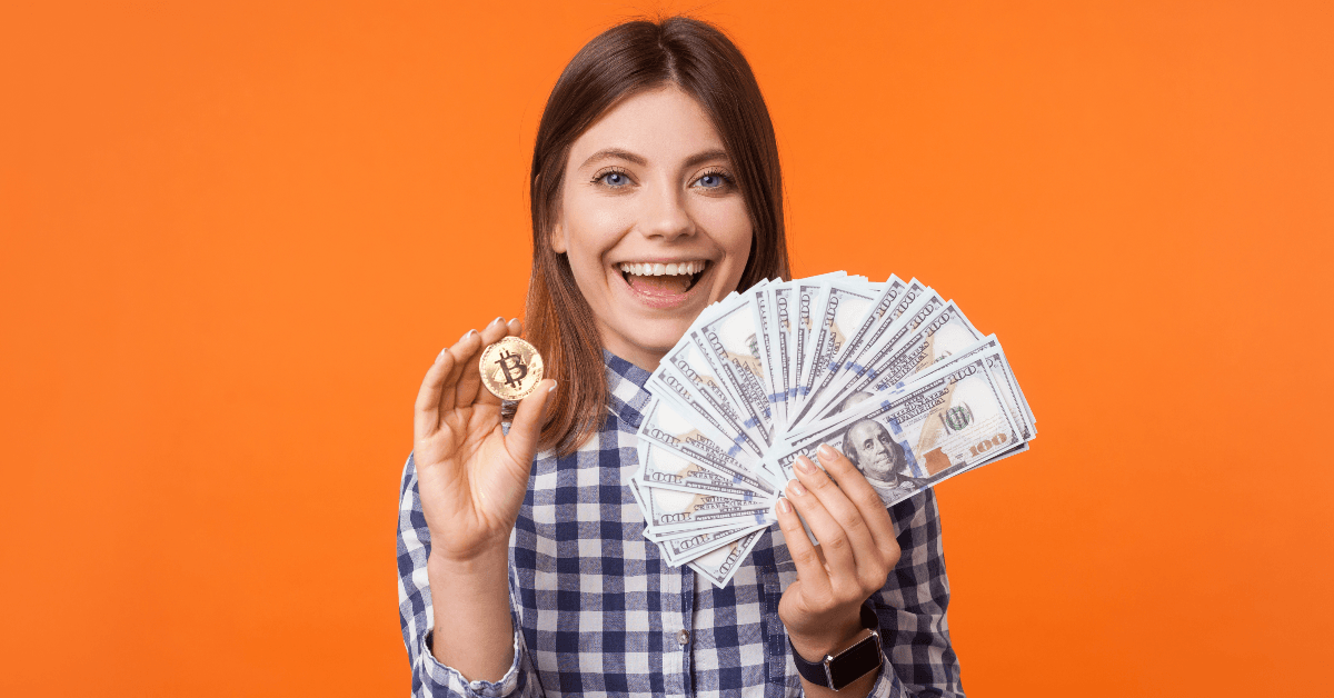 Woman holding money and cryptocurrency