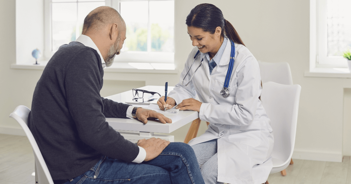 Man talking with doctor
