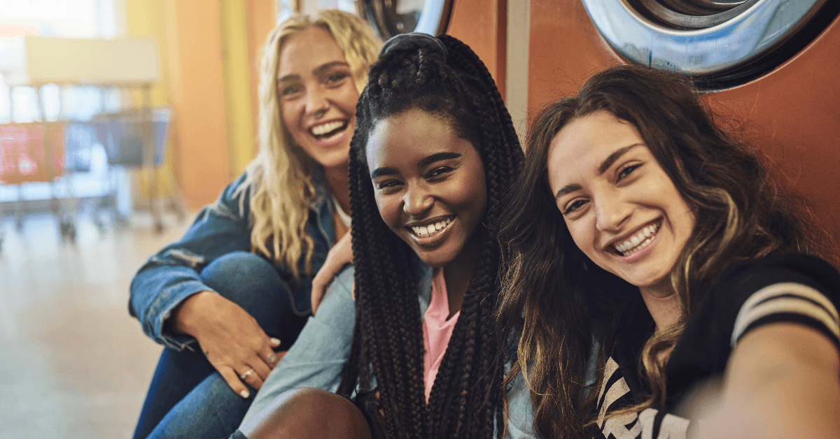 friends at laundromat