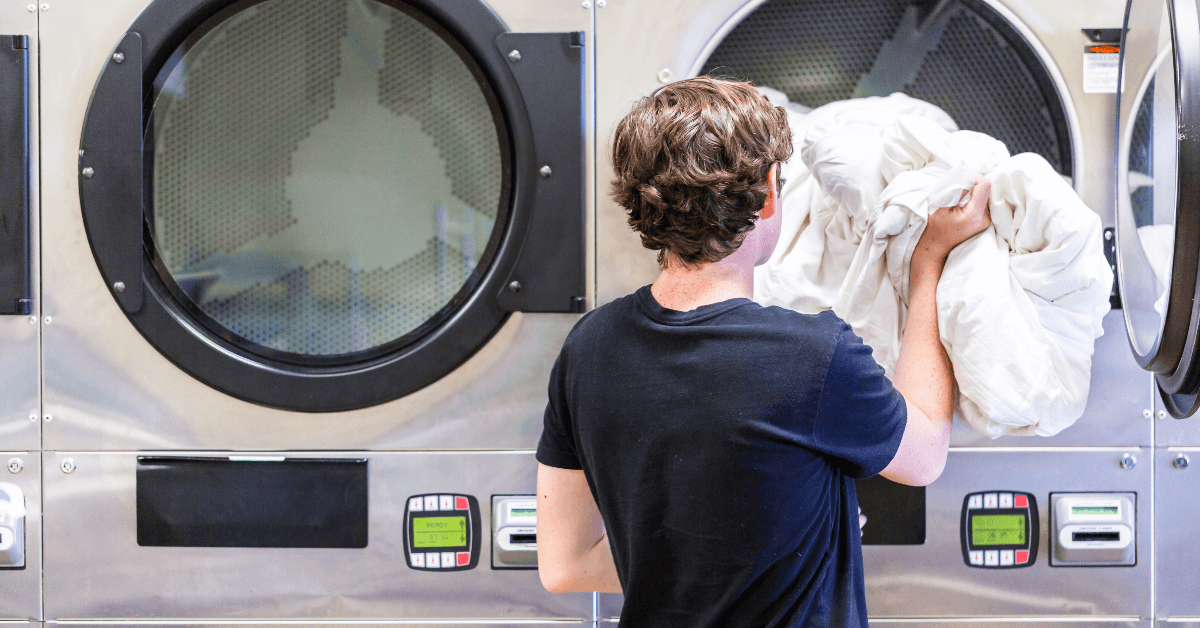 man at laundromat