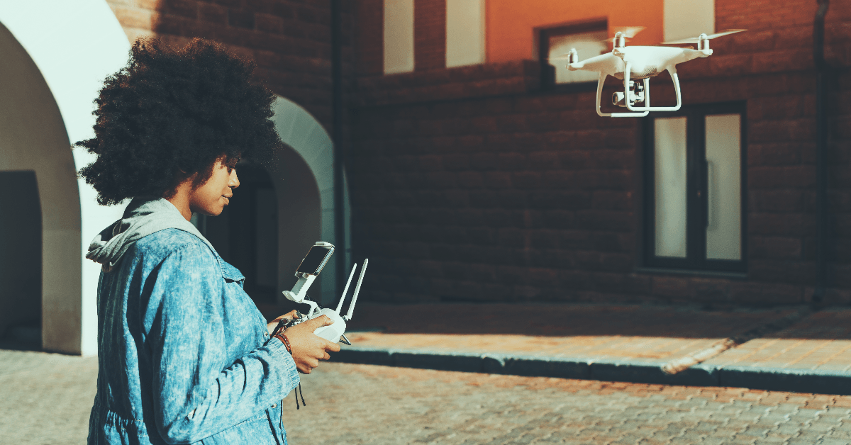 Woman flying drone
