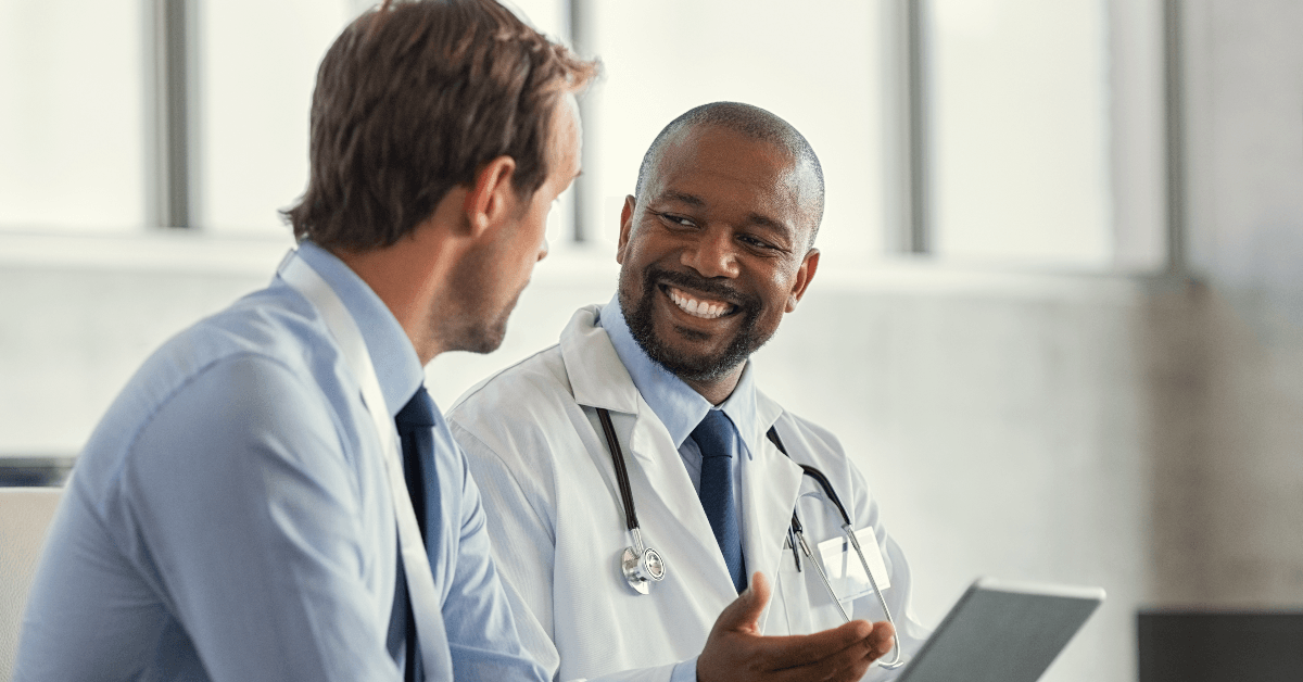 Man talking to doctor