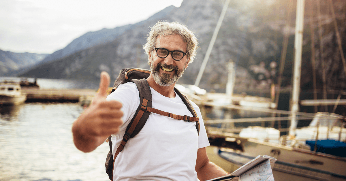 Happy man traveling