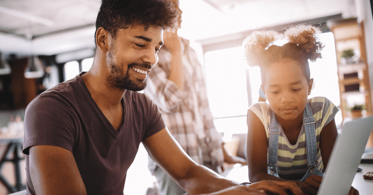 Man working from home with daughter
