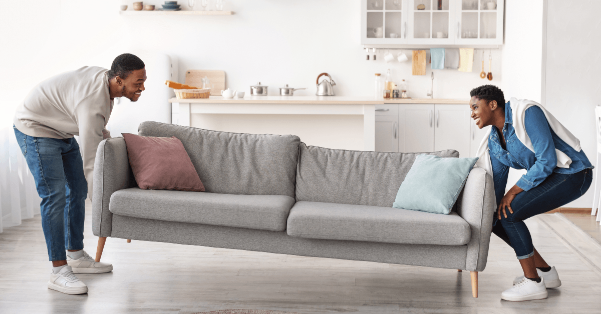 Couple moving couch
