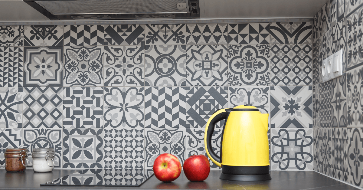 Electric kettle and apples on kitchen counter