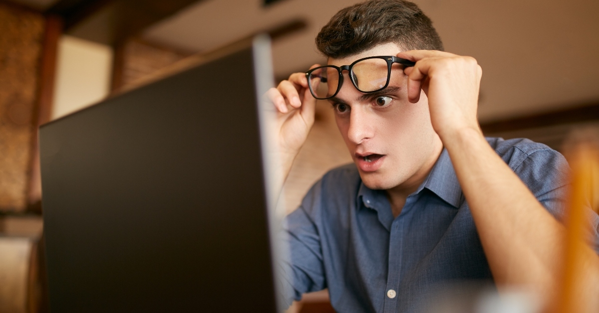 Shocked man on laptop