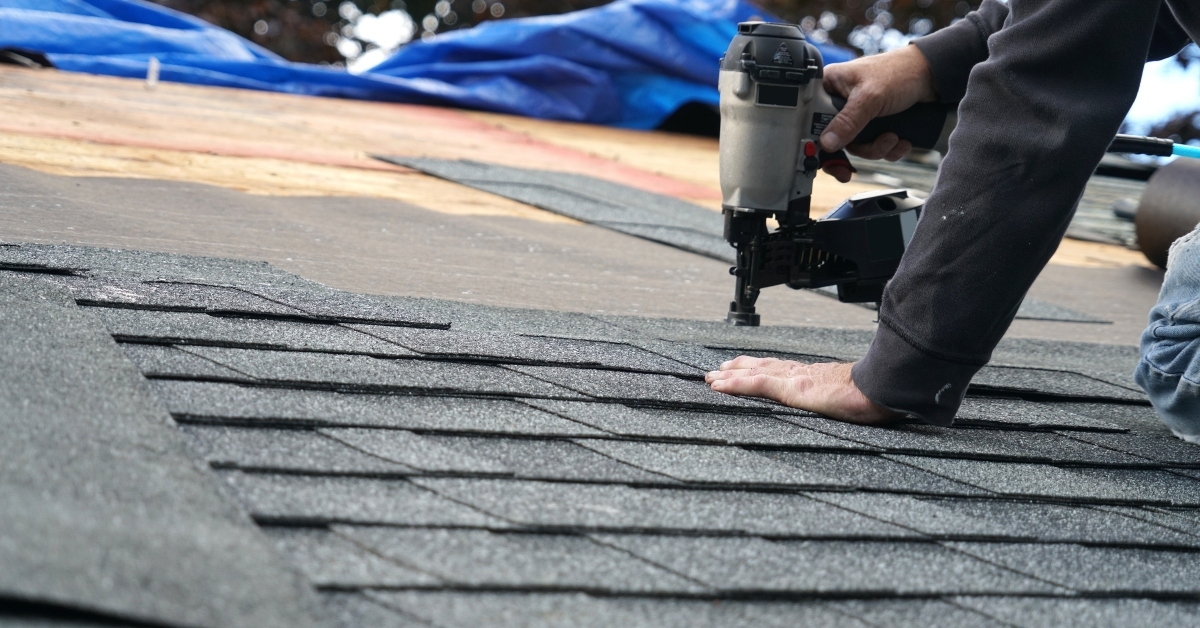 Man working on roof