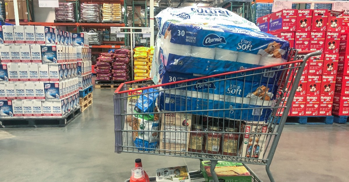 Grocery cart with toliet paper and supplies at Costco