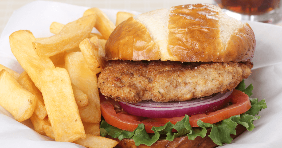 Breaded pork sandwich and fries