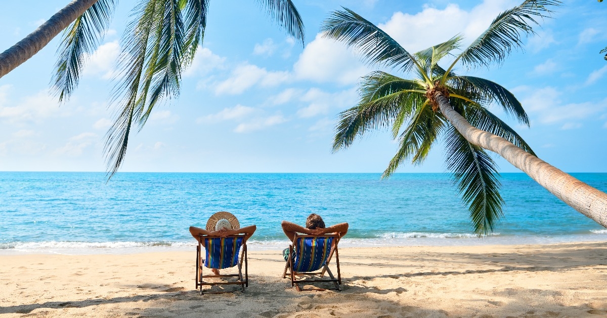 couple relax on the beach enjoying beautiful sea on the tropical island