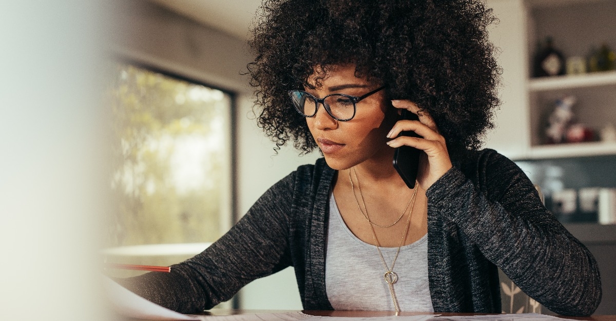 female architect talking with client over phone