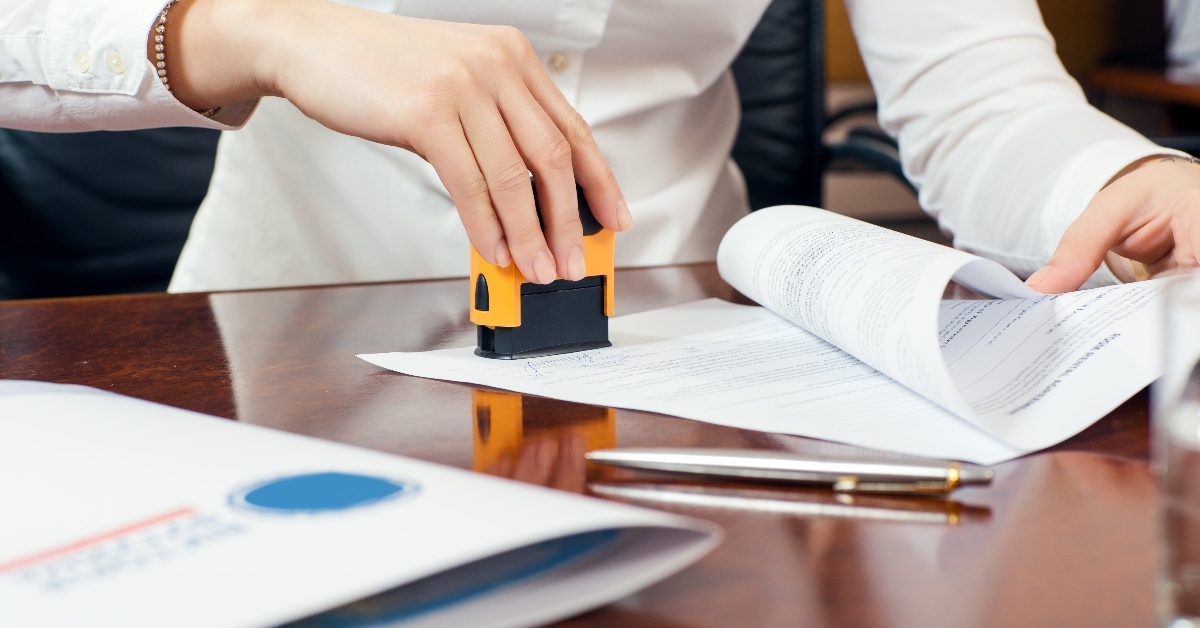 Notary stamping documents