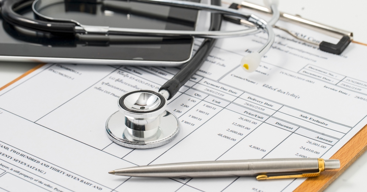 Hospital bill and stethoscope