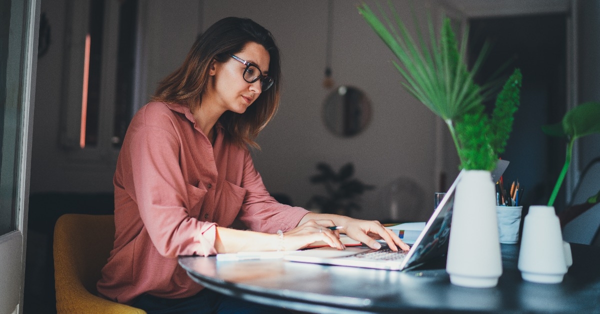 young female entrepreneur working remotely from a home office