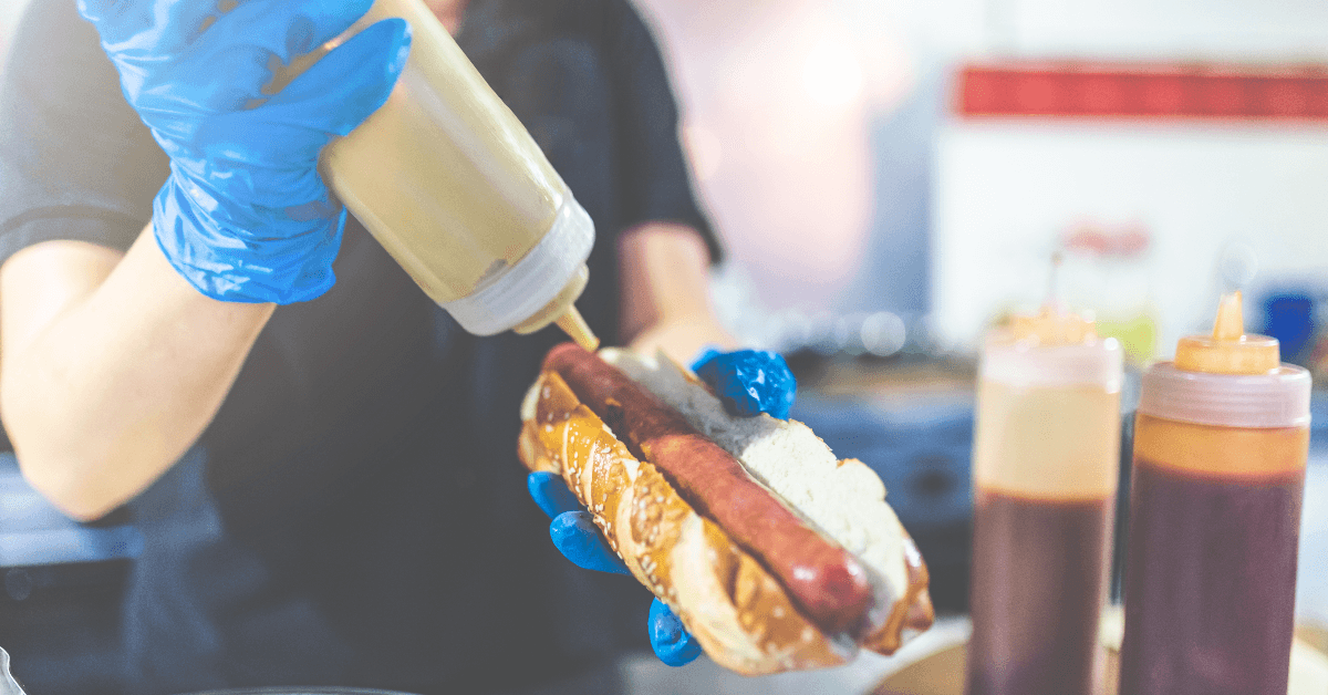 Man holding hot dog