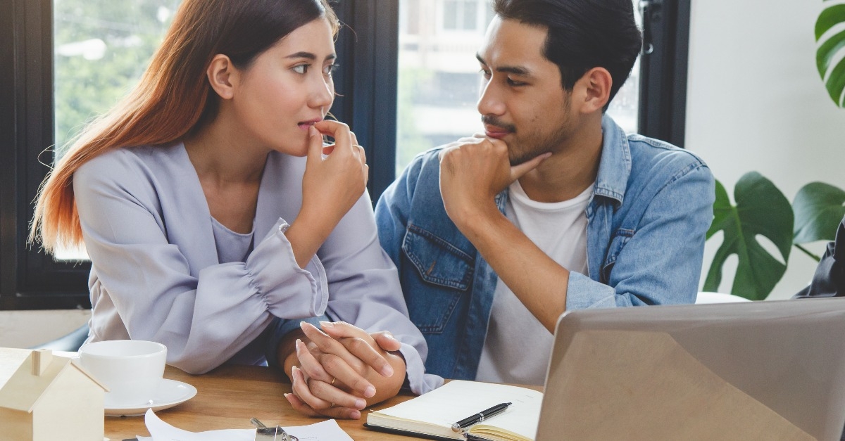 couple thinking about buying a property