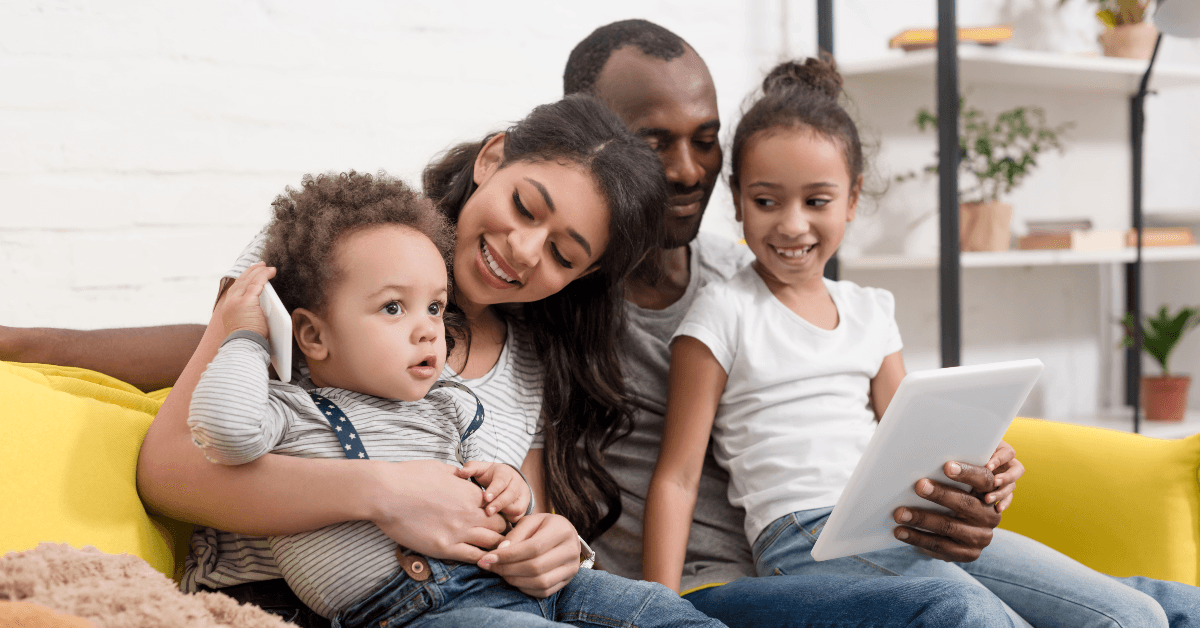 Happy family on sofa