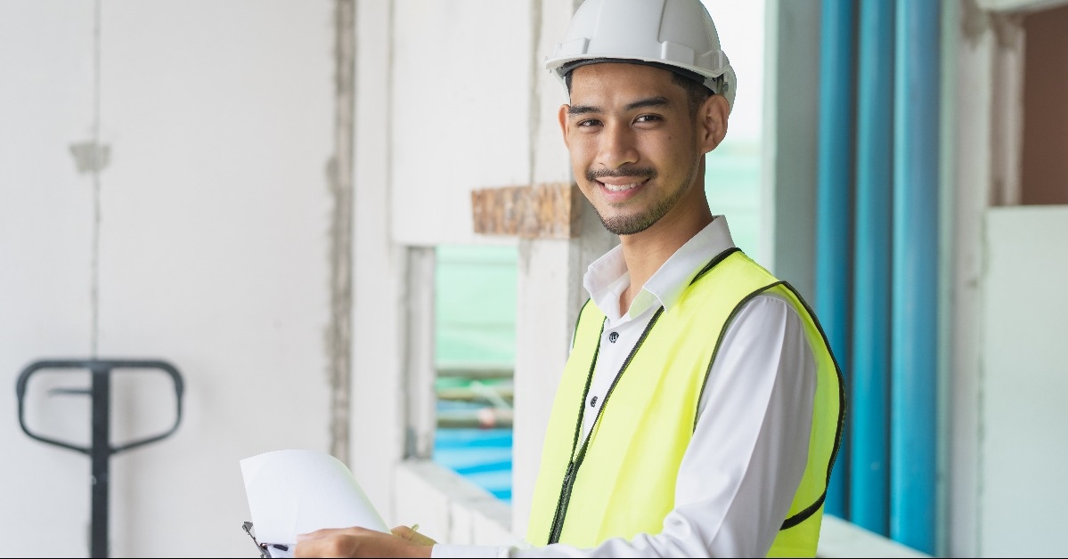 inspector checking material and structure in construction