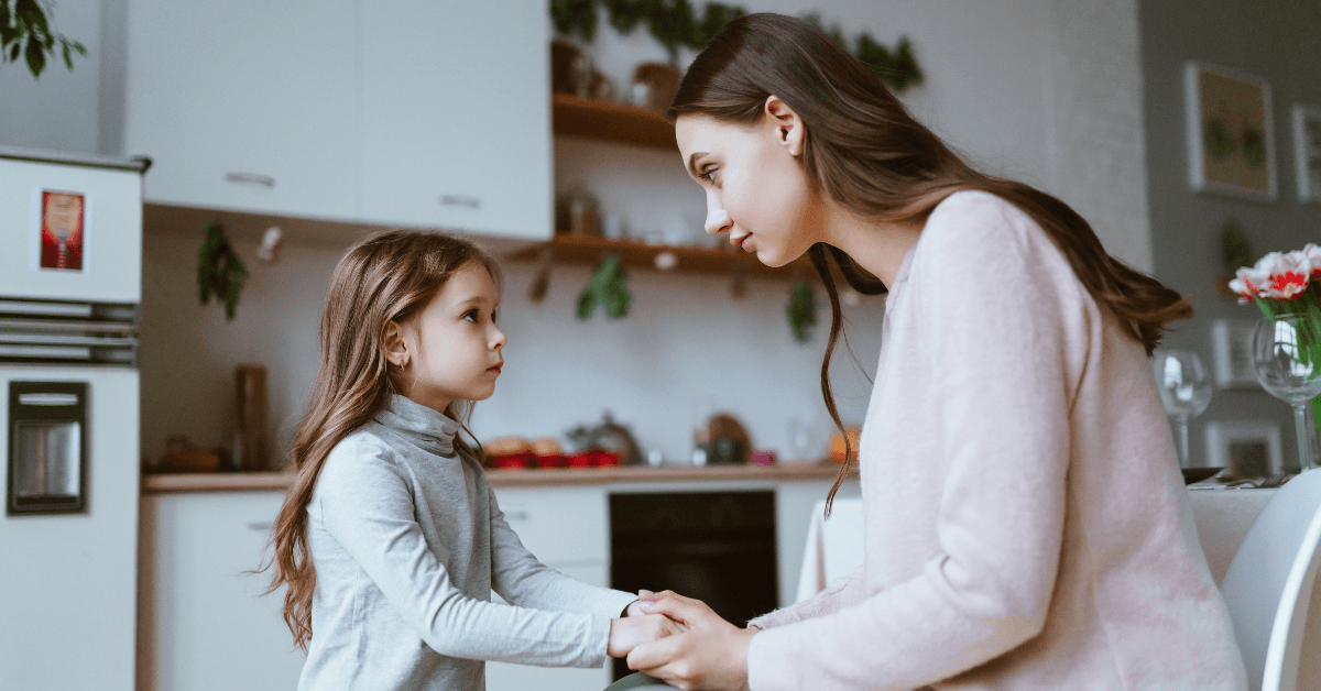 Mom talking to daughter