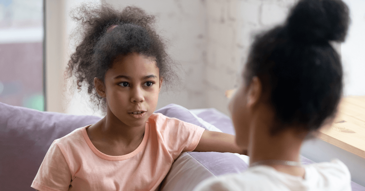 Mom talking to daughter