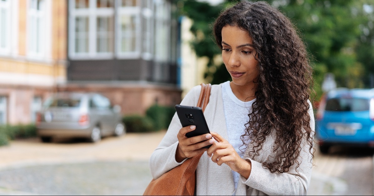 young woman looking at her phone