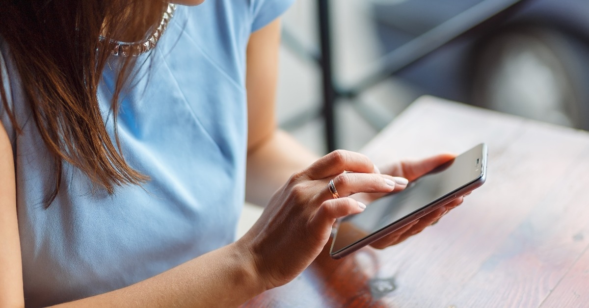 young woman is using her smart phone