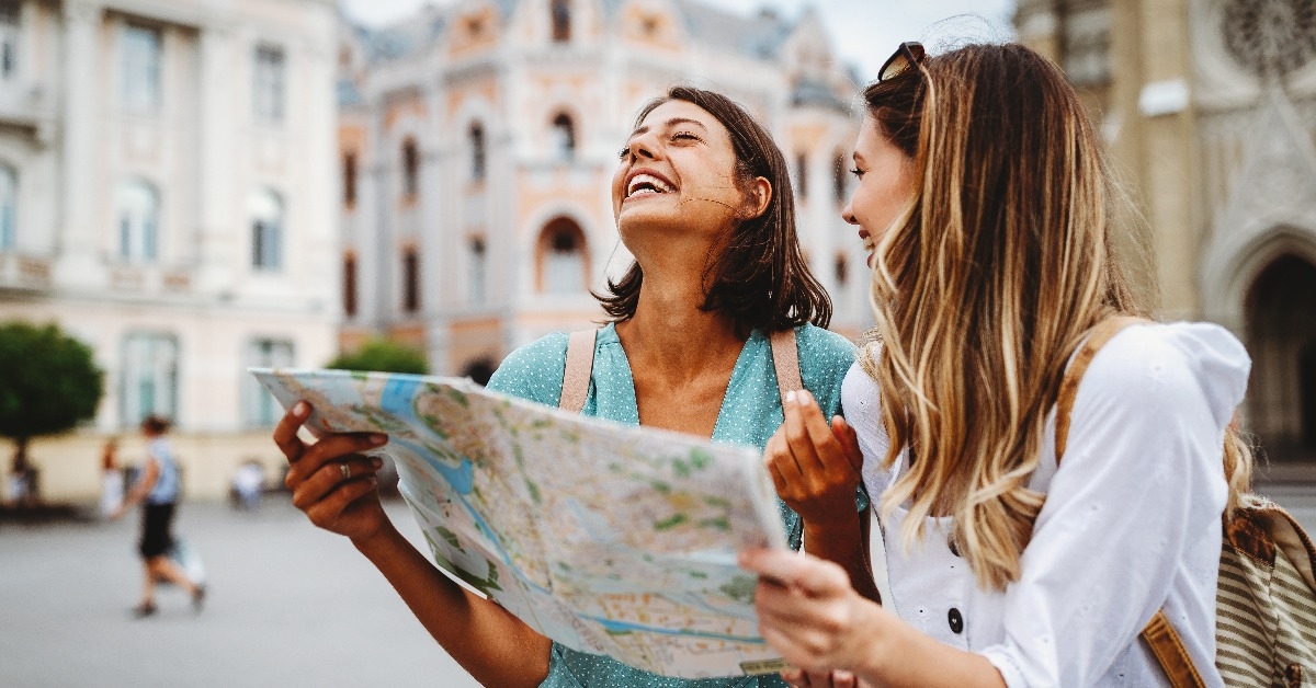 beautiful girls looking for direction in the city