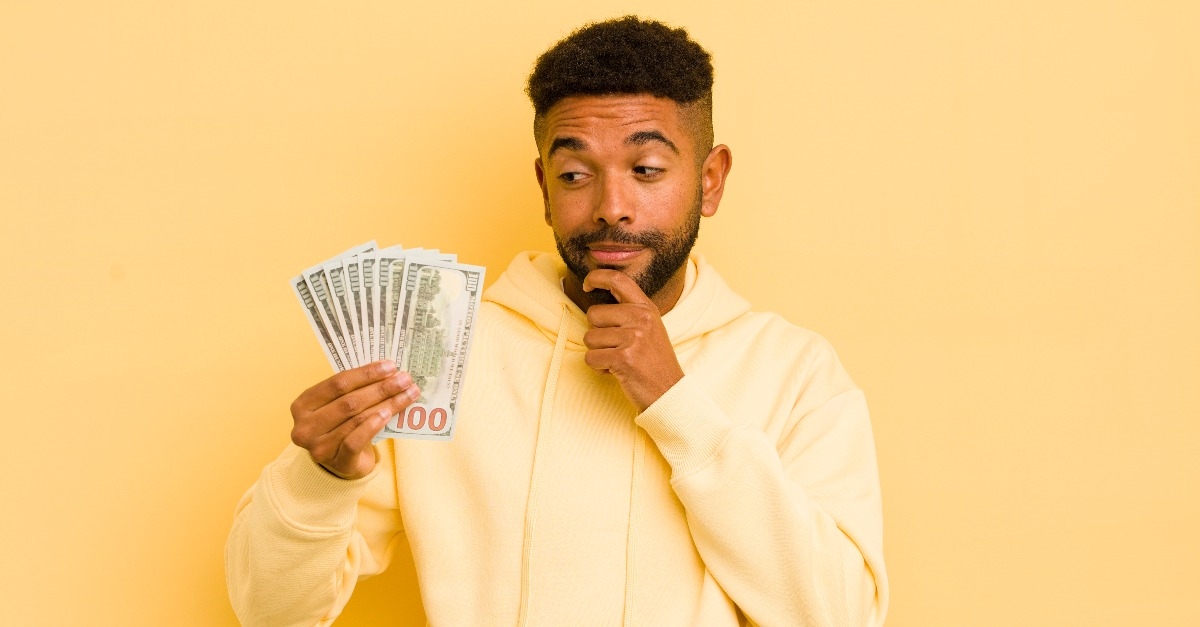 afro cool man with dollar banknote