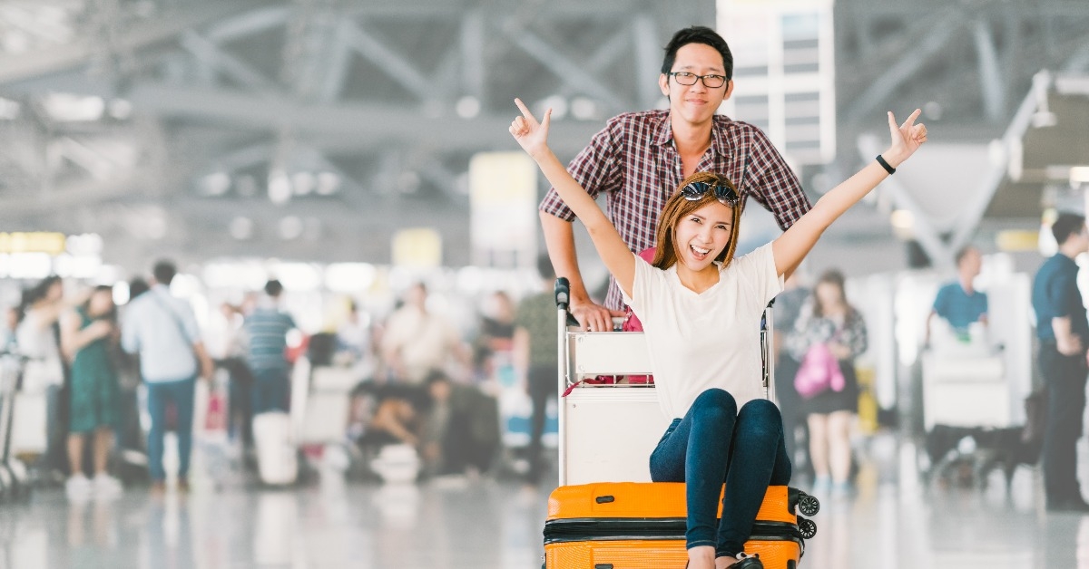 young Asian tourist couple happy and excited together for the trip