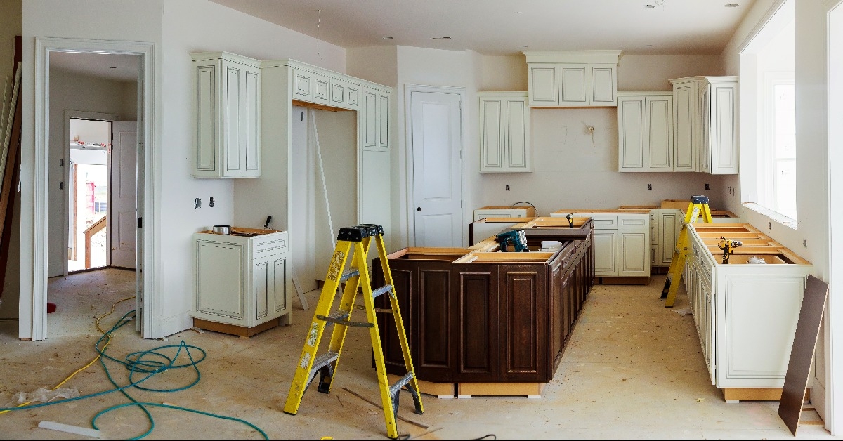 custom kitchen cabinets in various stages of installation