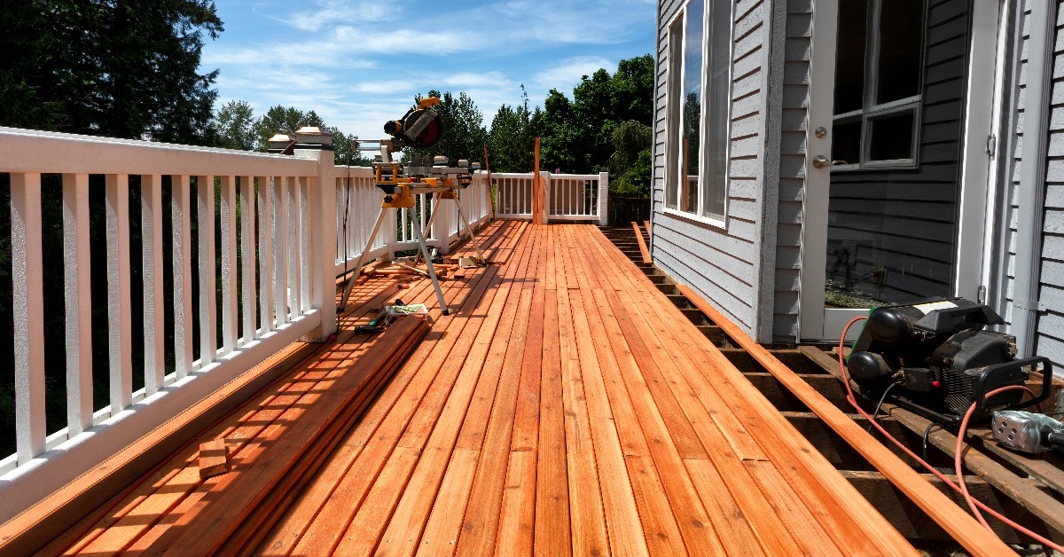 deck remodel with new red cedar wooden boards