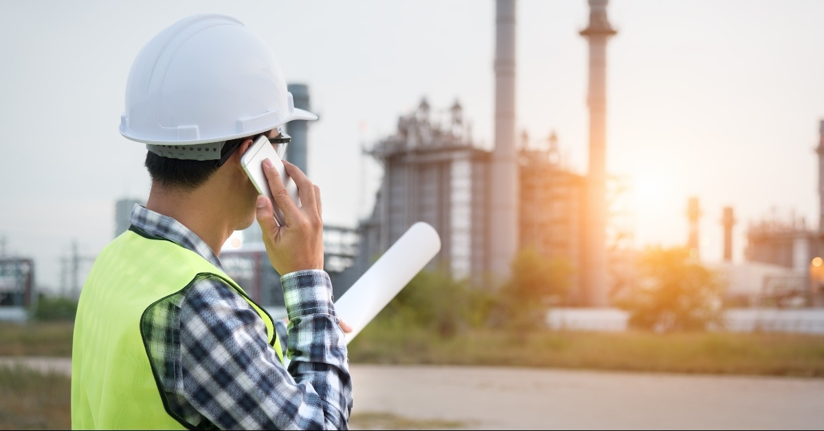 engineer working in the power plant with talking controlling work