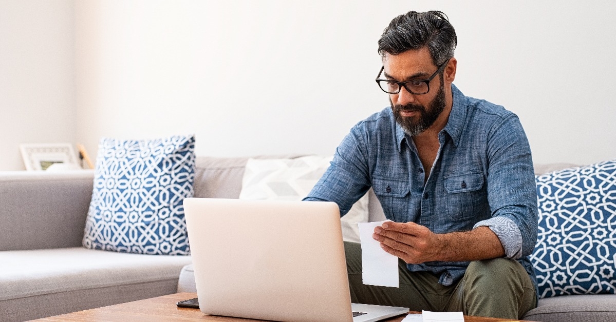 man managing bills