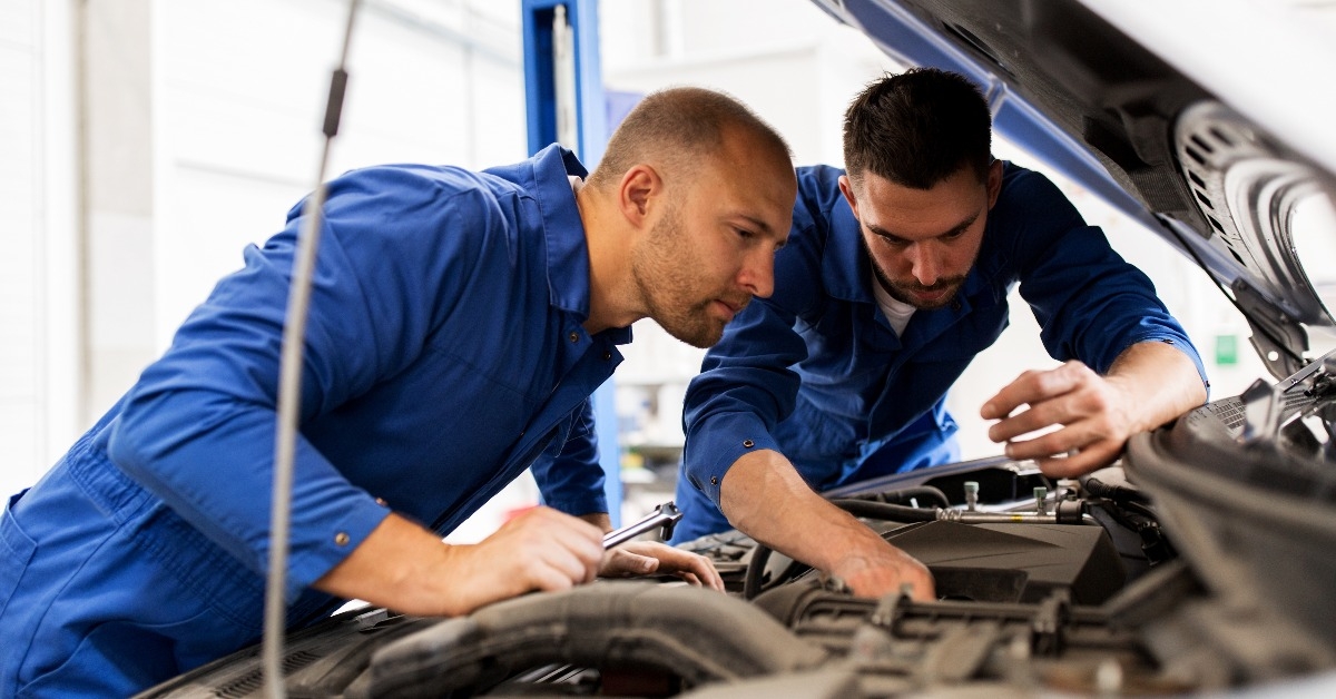 Mechanic looking at engine