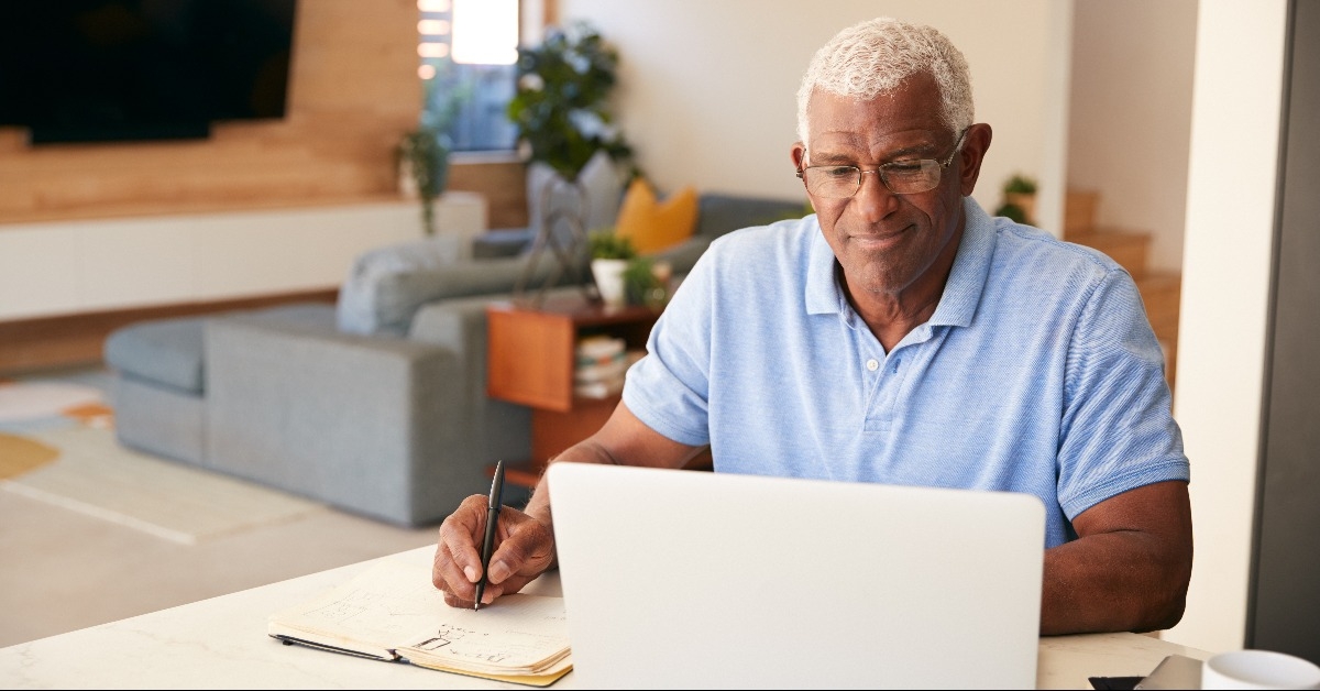 Senior man using laptop