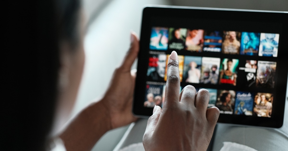 black woman browsing movie on streaming media service