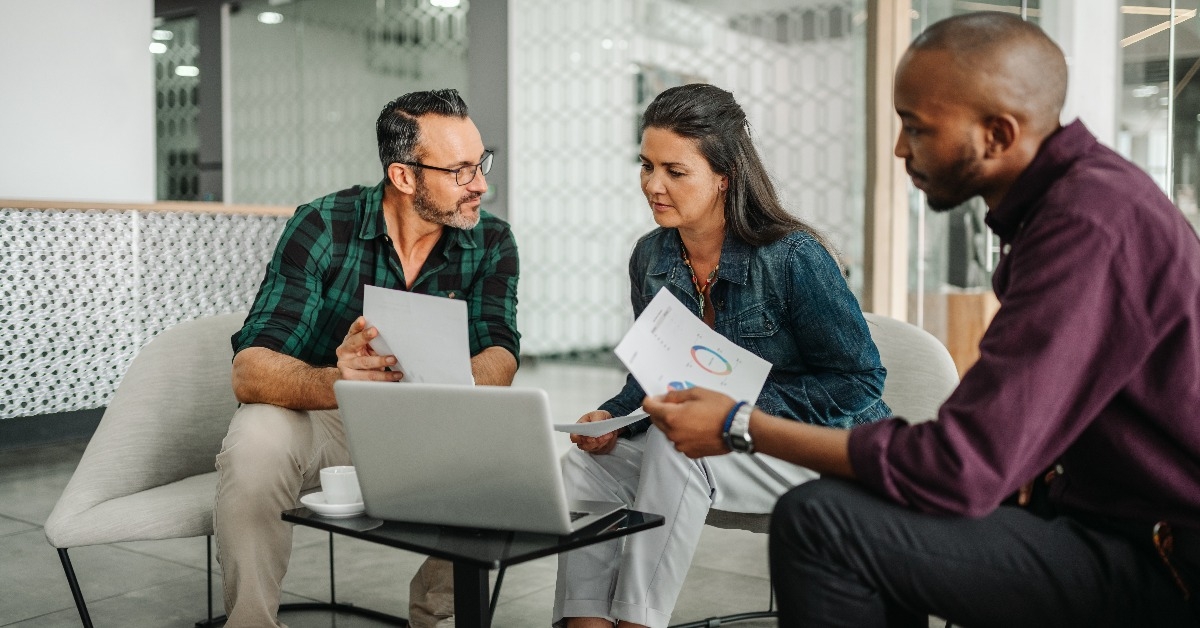 Casual meeting of diverse business team