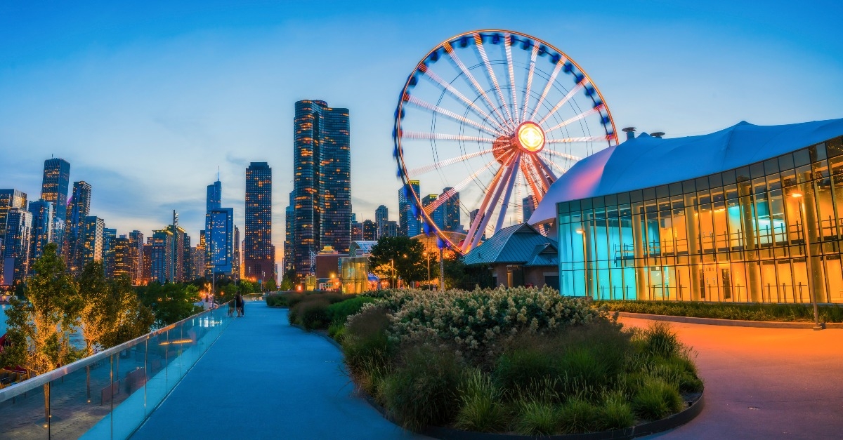 beautiful Navy pier at dusk with chicago skyline