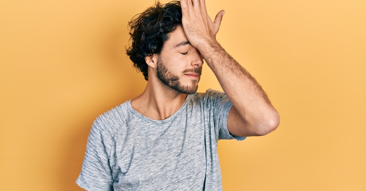 Man smacking forehead